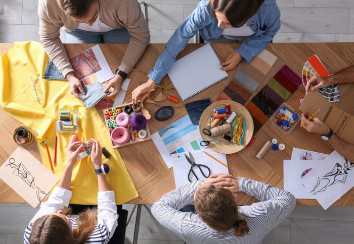 Four makers at a table