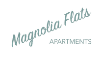 Magnolia Flats Apartments logo with light teal cursive text on white background.