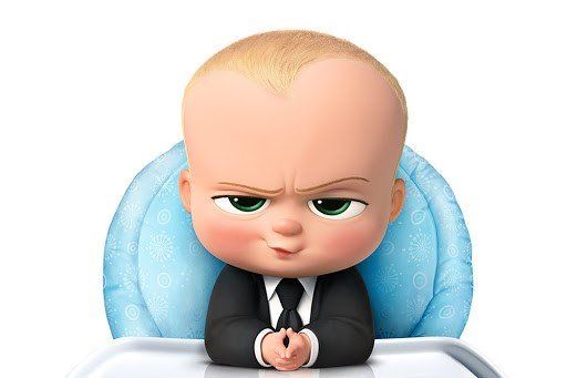 a baby in a suit sitting at a table acting as your wealth advisor