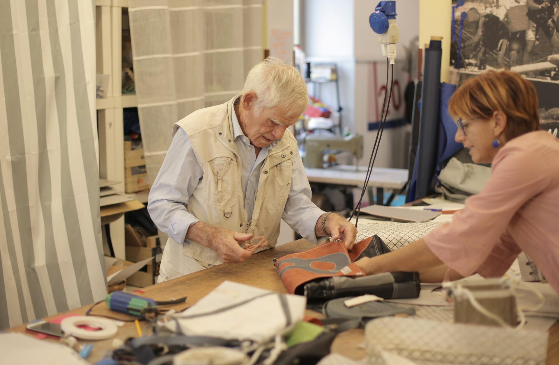 A couple working after retirement at a craft store