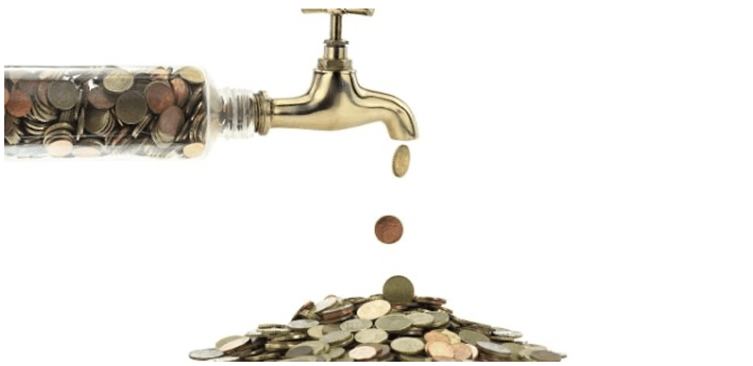 A faucet with coins coming out of it