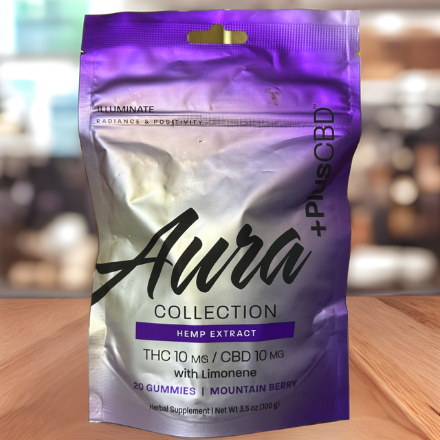 Aura Collection hemp extract gummies in a purple bag, THC 10mg/CBD 10mg, mountain berry flavor.