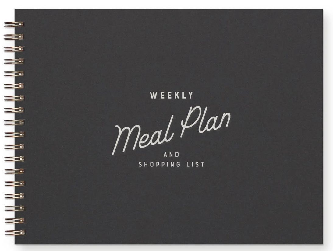Black spiral-bound meal planner with 