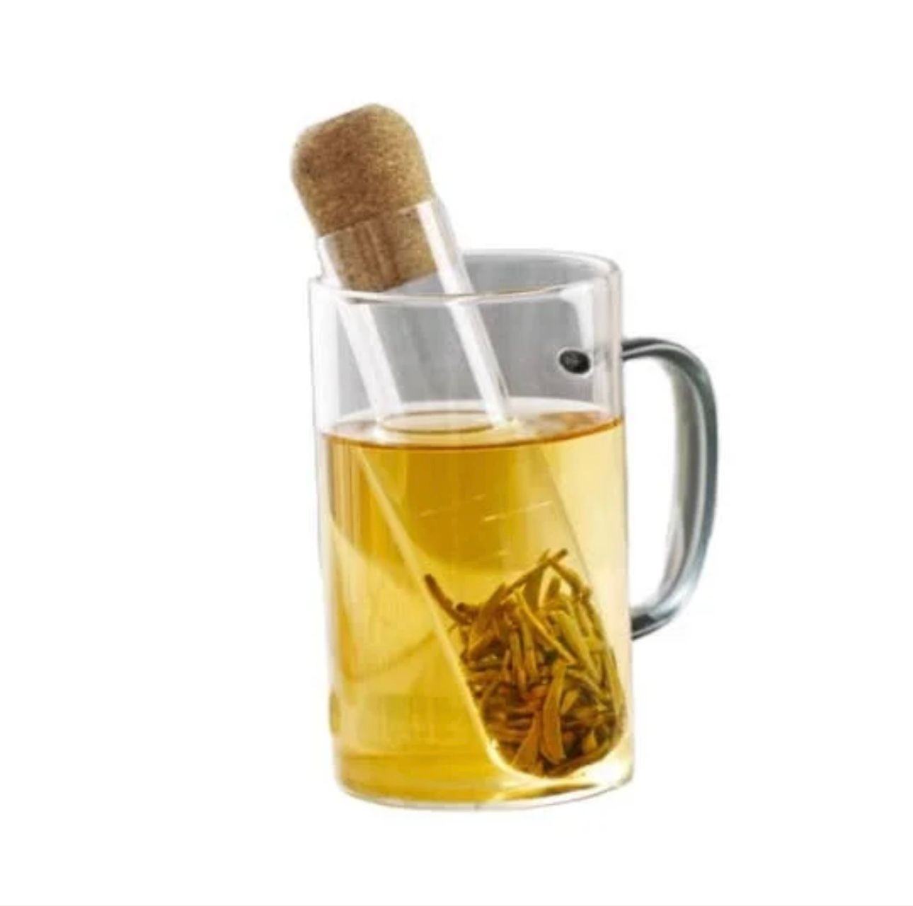 Glass mug with tea and a glass infuser filled with loose tea leaves, cork stopper.