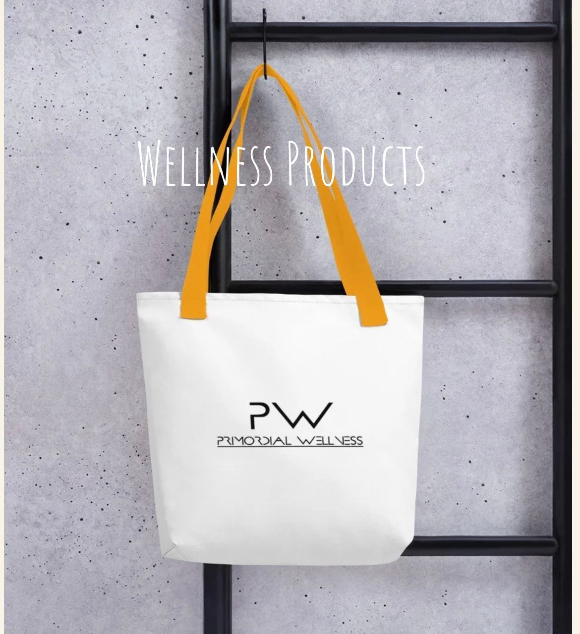 White tote bag with yellow straps hanging on a black ladder. The bag has the