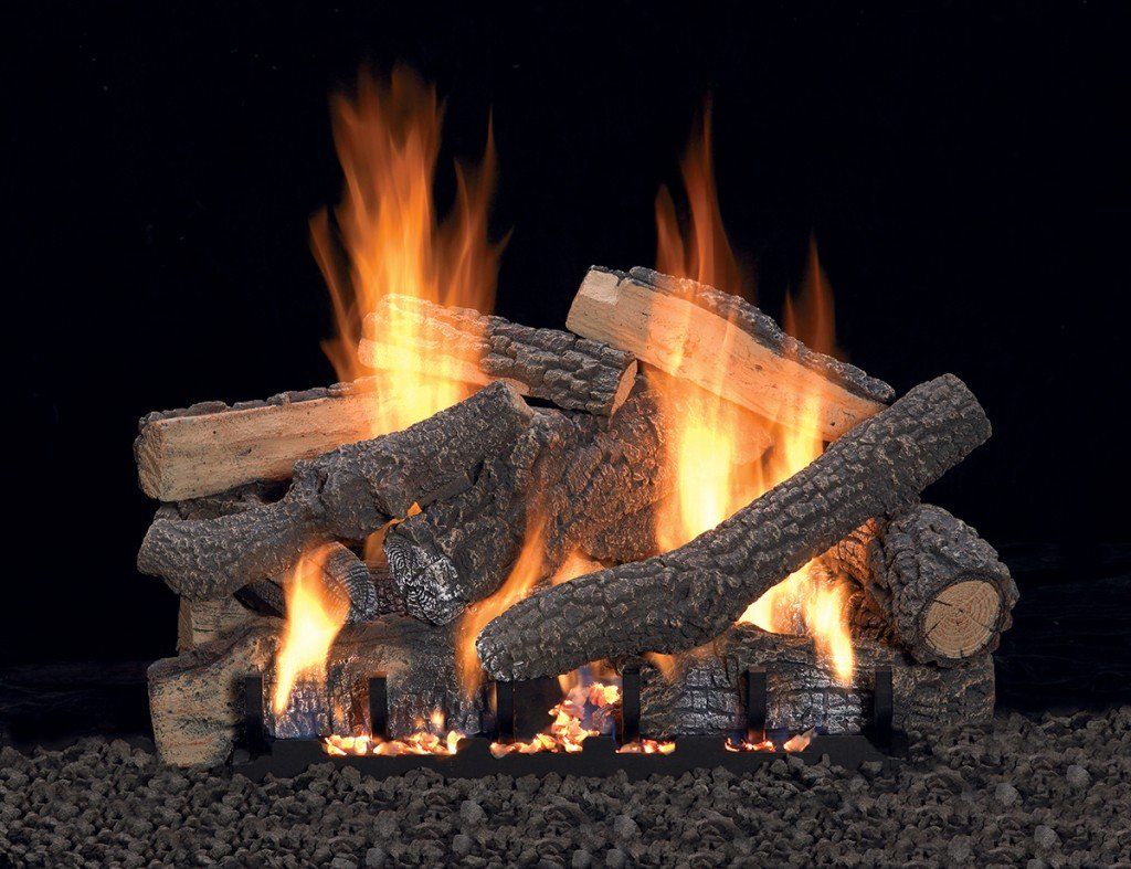 Burning gas fireplace with ceramic logs and flickering flames.