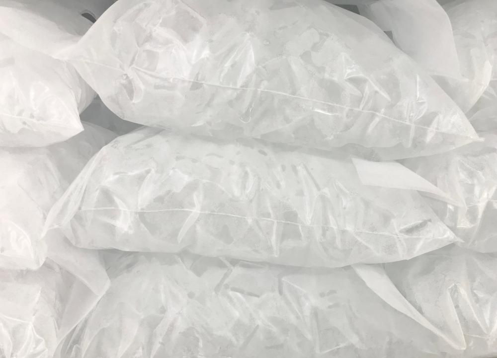 A Pile of White Plastic Bags Stacked on Top of Each Other — Cool Blue Ice & Water in Gunnedah, NSW