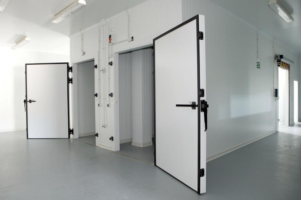 Three White Doors Are Open in A Room with A Gray Floor — Cool Blue Ice & Water in Mudgee, NSW