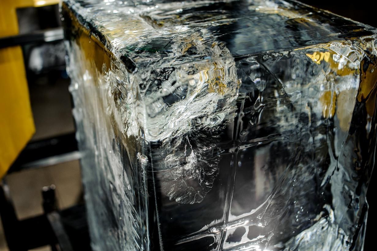 A Large Piece of Ice Is Sitting on Top of A Table — Cool Blue Ice & Water in Moree, NSW