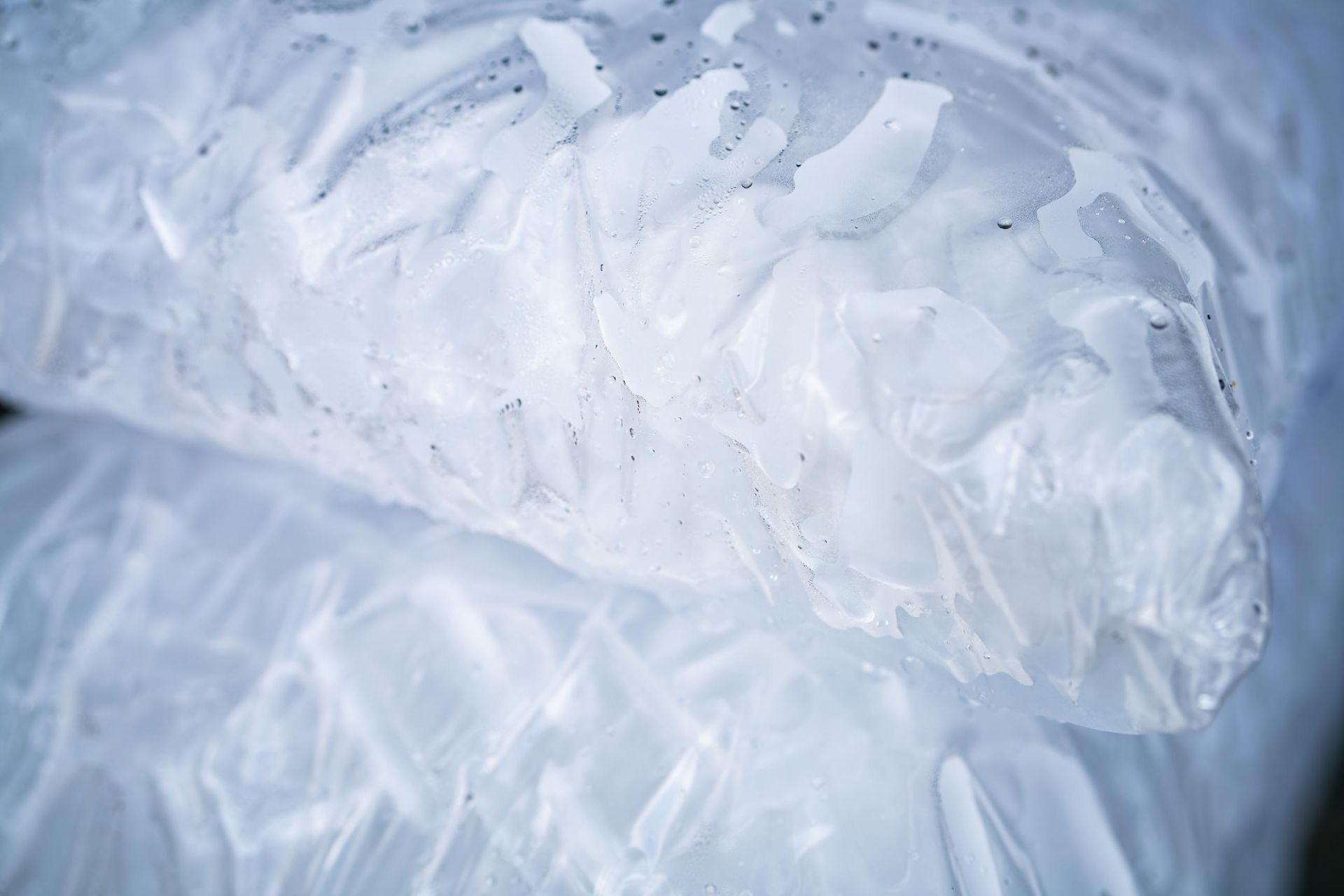 A Close up Of a Piece of Ice with Bubbles Coming out Of It — Cool Blue Ice & Water in Muswellbrook, NSW
