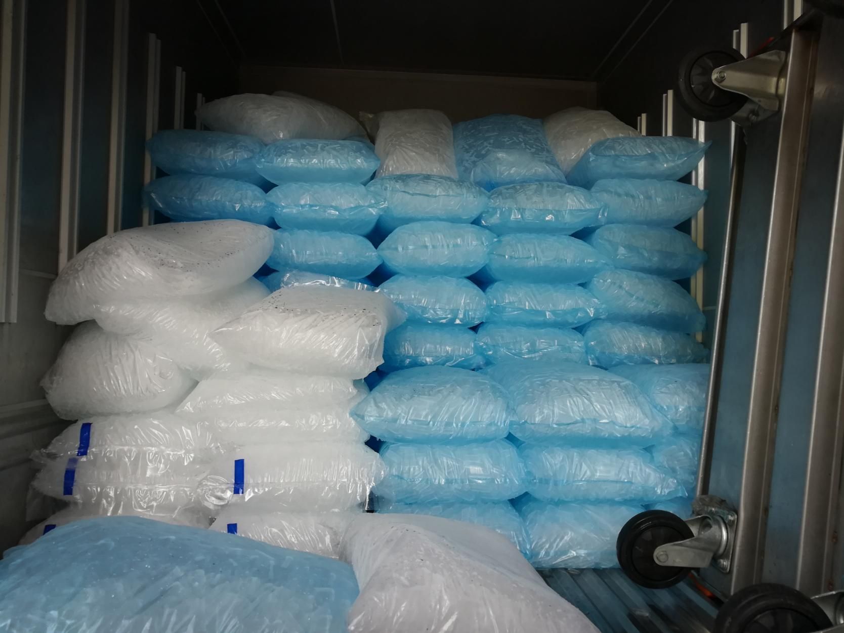 Blue and White Bags of Ice Are Stacked on Top of Each Other — Cool Blue Ice & Water in Walgett, NSW