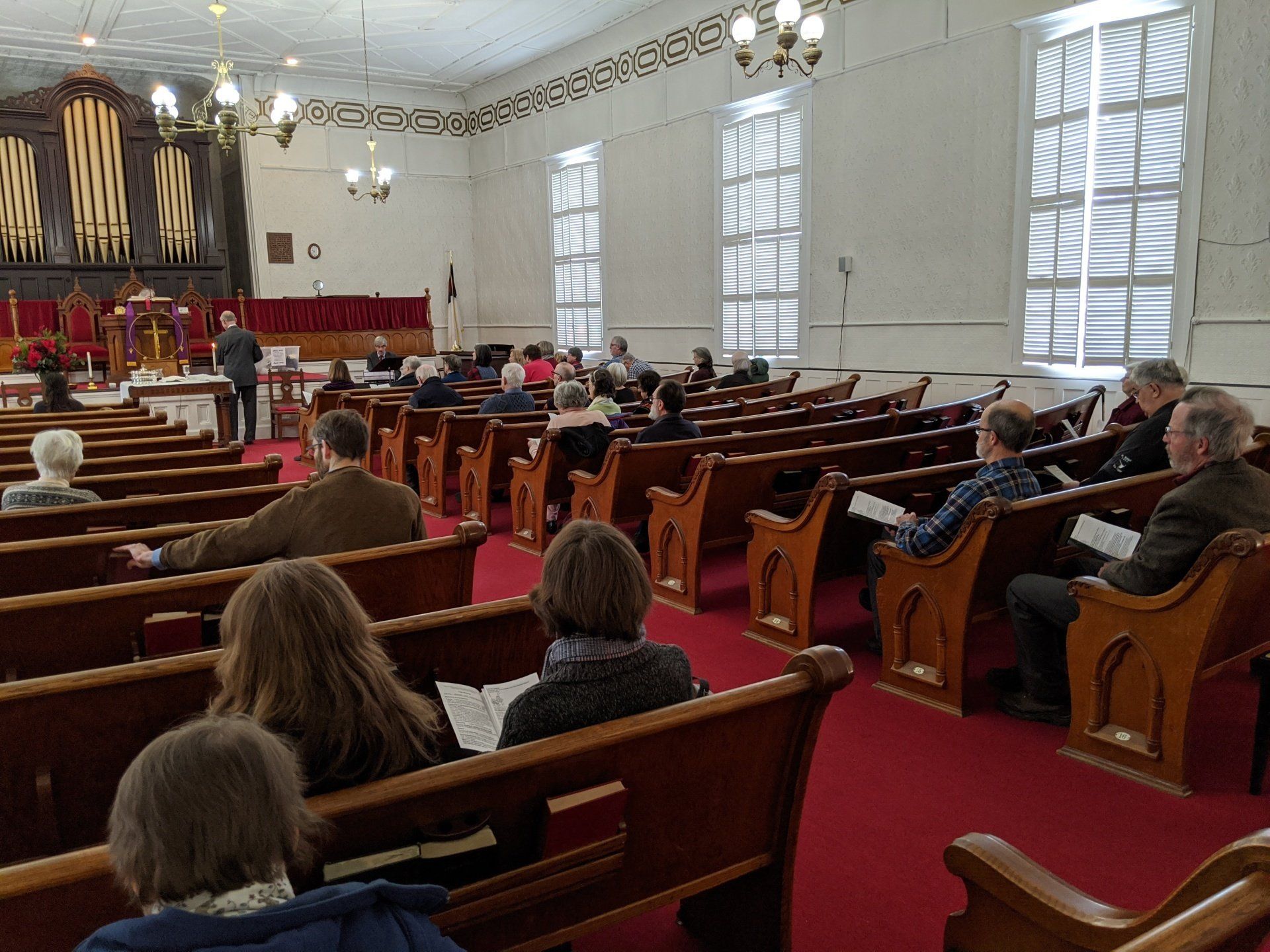 Photo of people in the Pews during a service