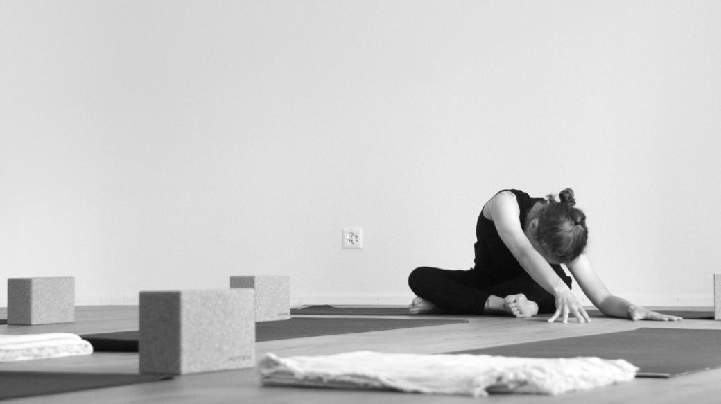 Seated forward fold with sidebend