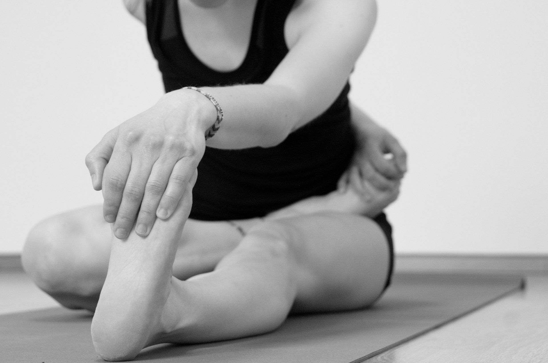 Half Lotus seated forward fold