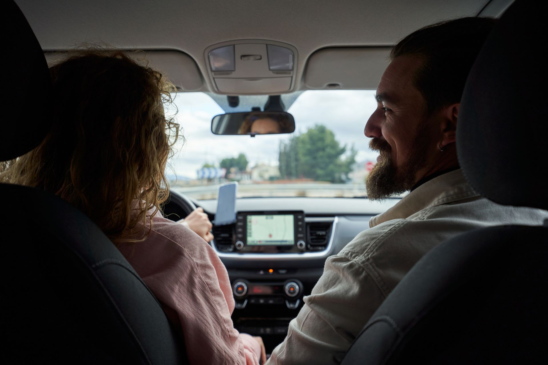 Young Couple Talking Inside car, Concept for Auto Insurance Quotes | Forest City, NC Young Couple Talking Inside car, Concept for Auto Insurance Quotes | Forest City, NC