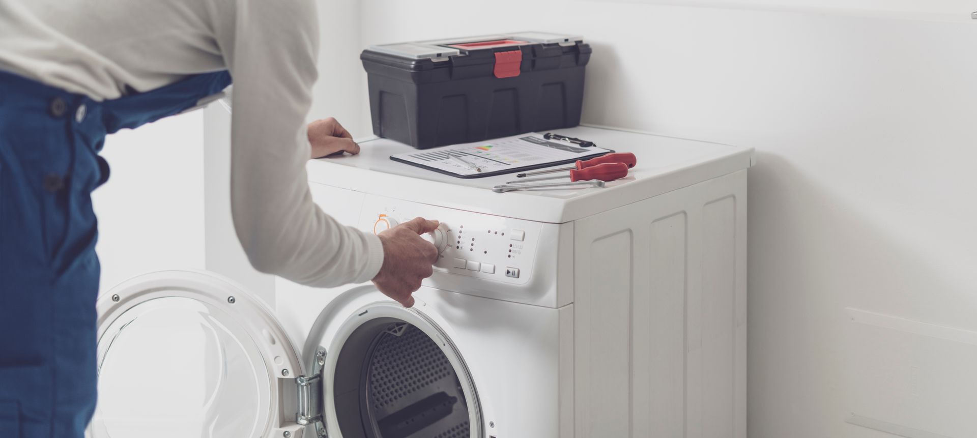 technician performing appliance repair services