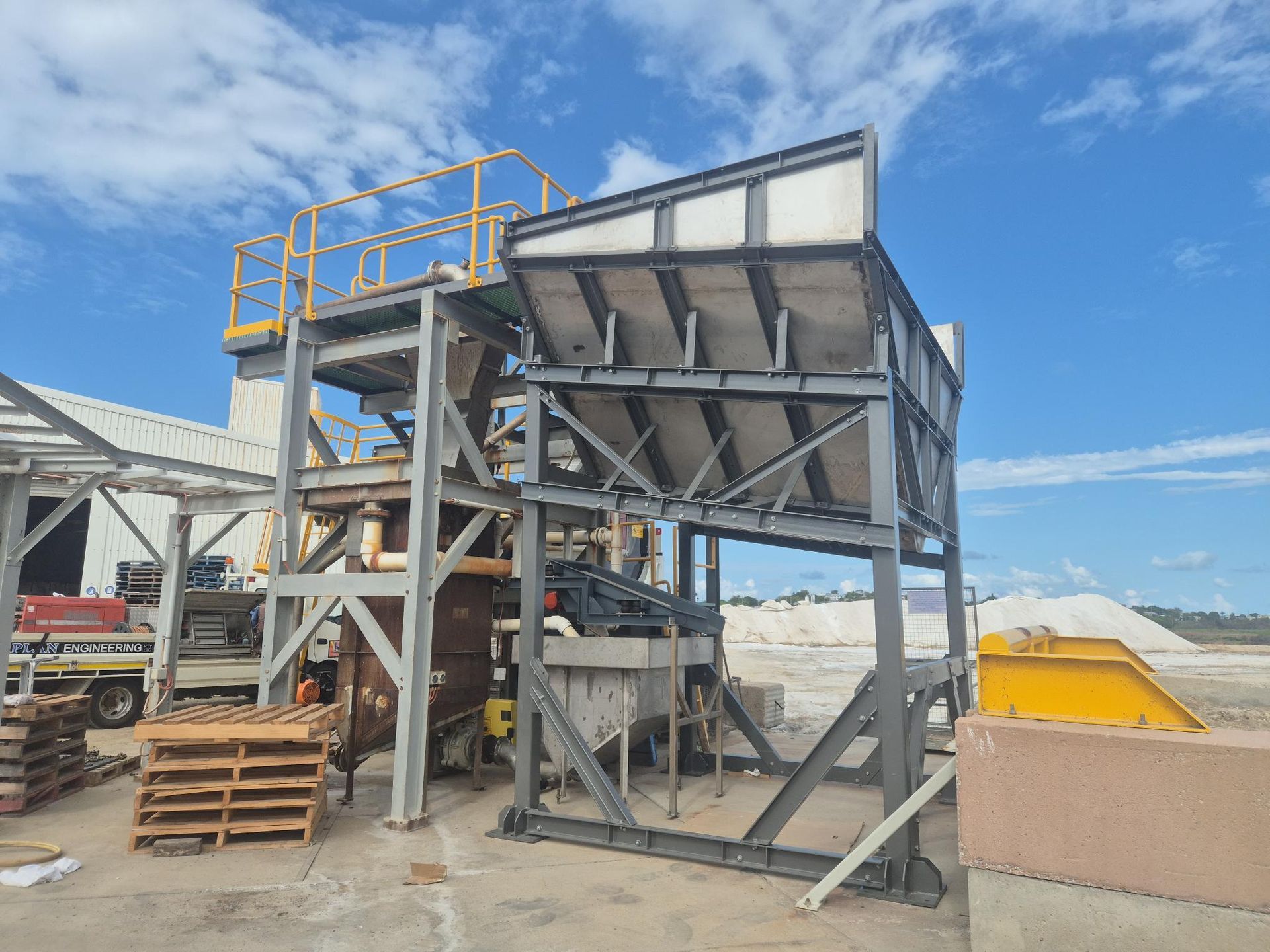Industrial Metal Hopper Structure at an Outdoor Construction Site — Kaplan Engineering Pty Ltd In Bowen, QLD