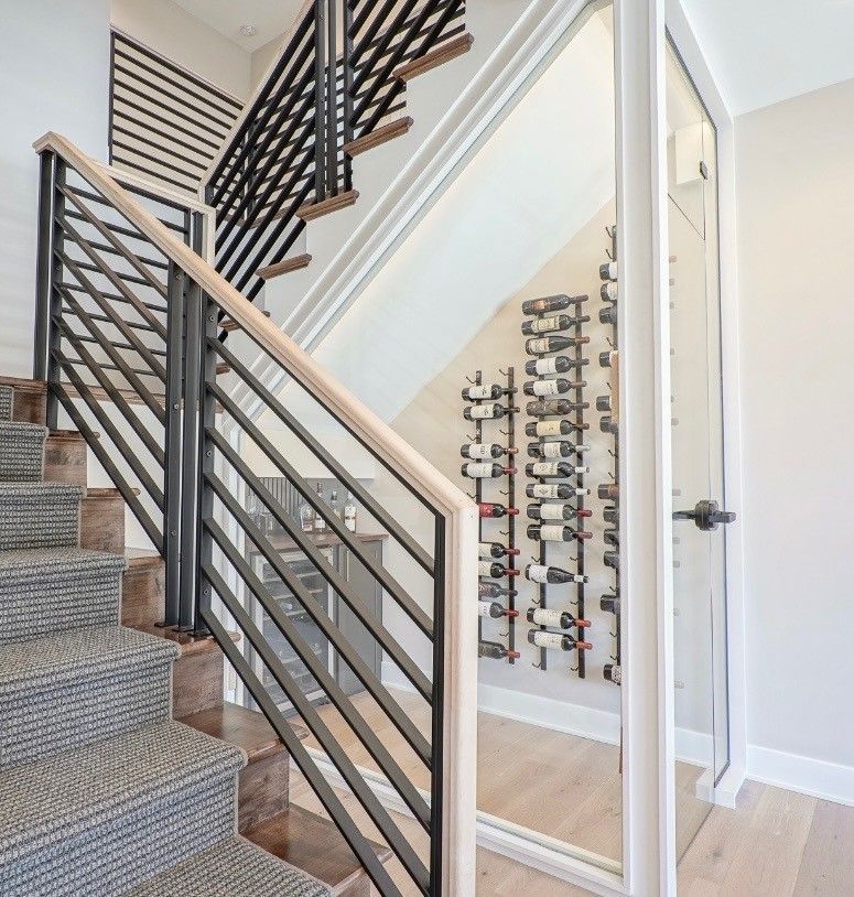 A staircase leading up to a wine cellar