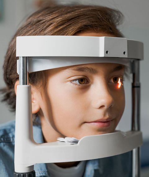 Boy Checking Vision With Tonometer — Youngstown, OH — Union Eyes Optical Inc