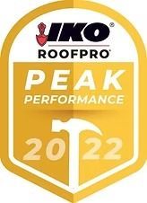 IKO Roofpro Peak Performance award badge, gold and white, with a hammer icon and 2022.
