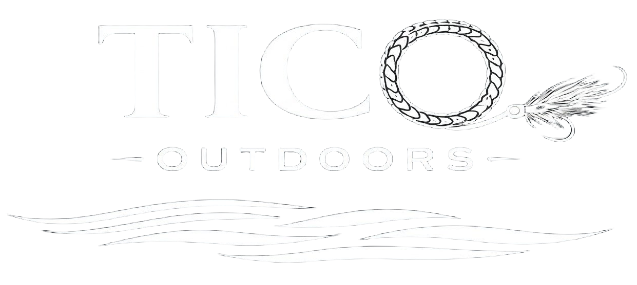 Faded white logo with large letters and a circular wreath, above a faint landscape line drawing