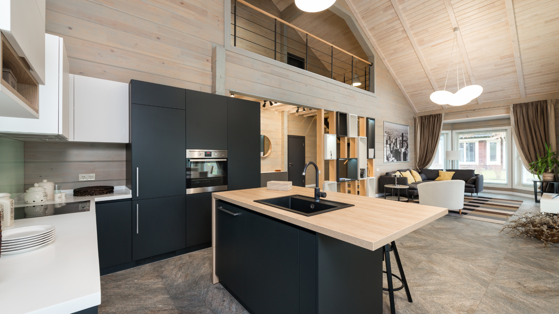 A kitchen with a large island in the middle of the room.