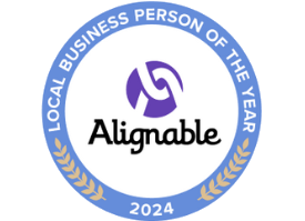 Alignable Local Business Person of the Year 2024 award. Blue circle with logo, text, and laurel leaves.
