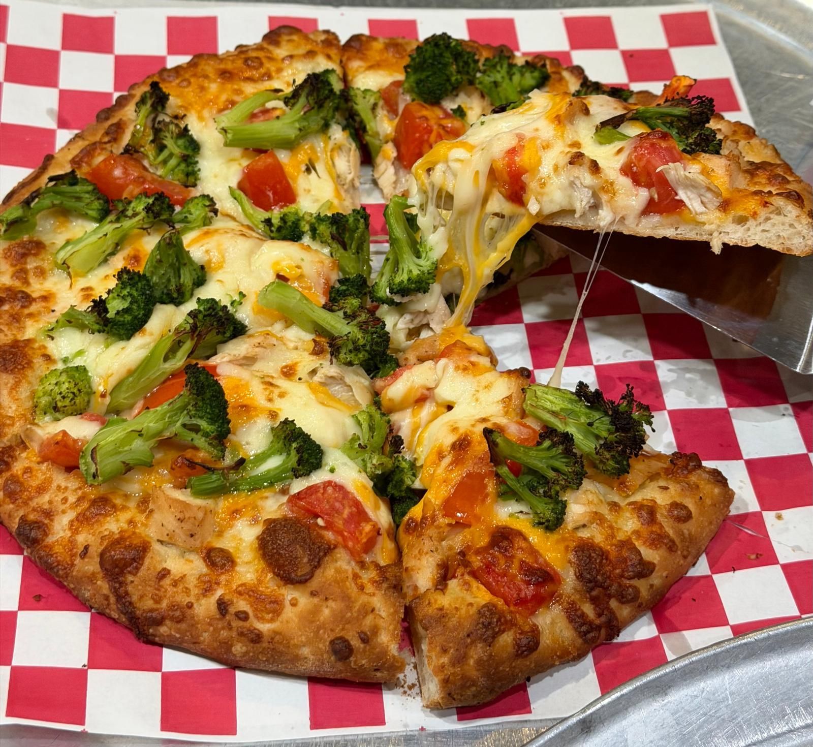 Rialto Pizza lunch special: Chicken wings, fries, and soda for $13.99, Monday 11 AM-3 PM.