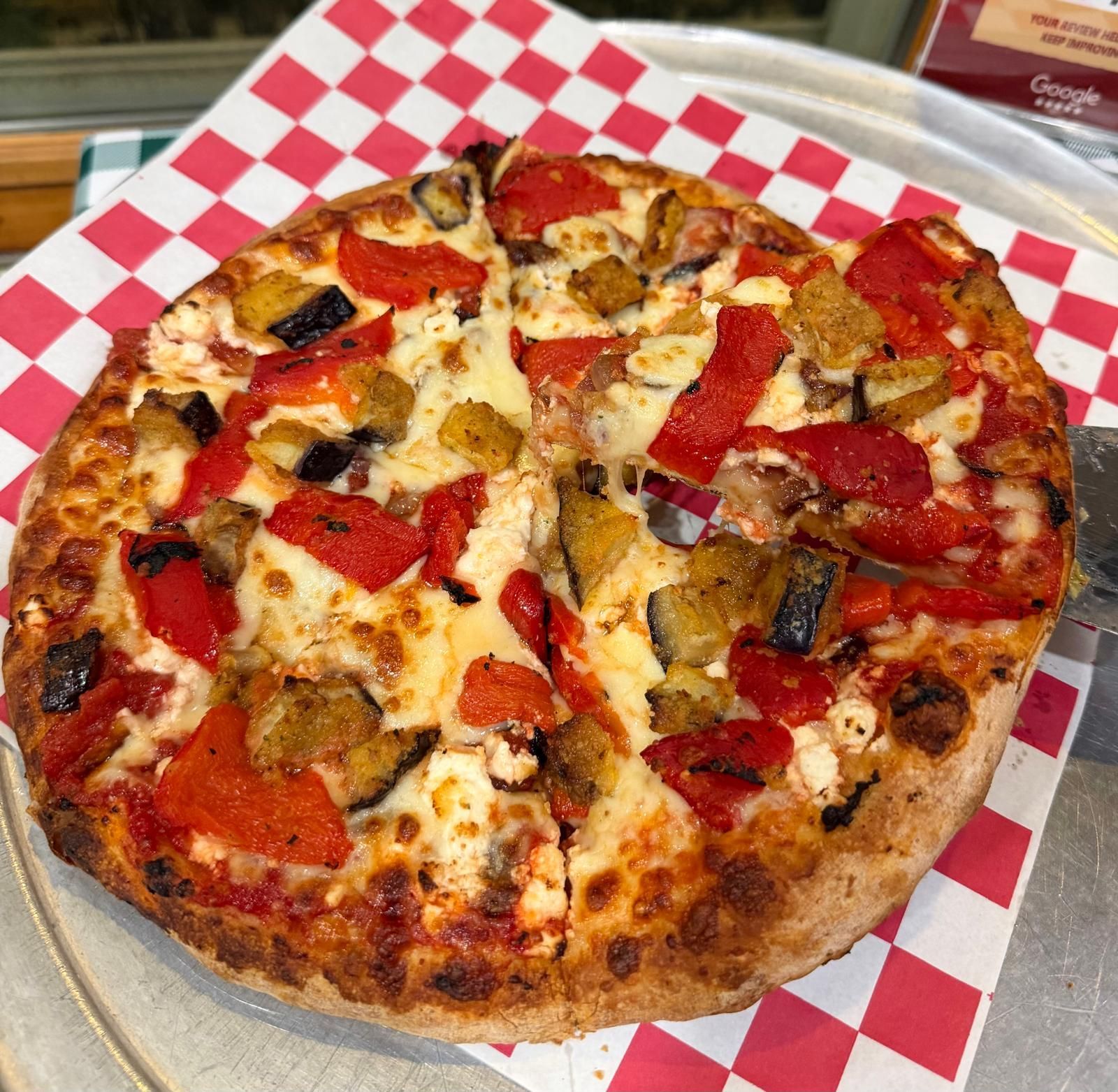 Rialto Pizza lunch special: Chicken wings, fries, and soda for $13.99, Monday 11 AM-3 PM.