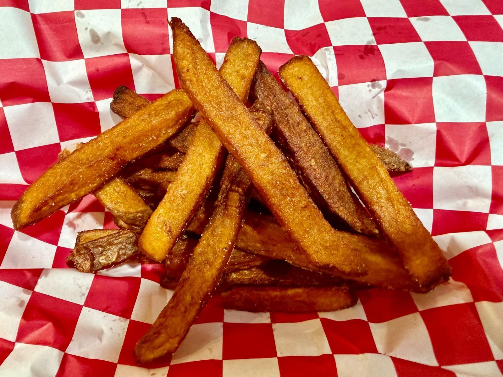Rialto Pizza lunch special: Chicken wings, fries, and soda for $13.99, Monday 11 AM-3 PM.