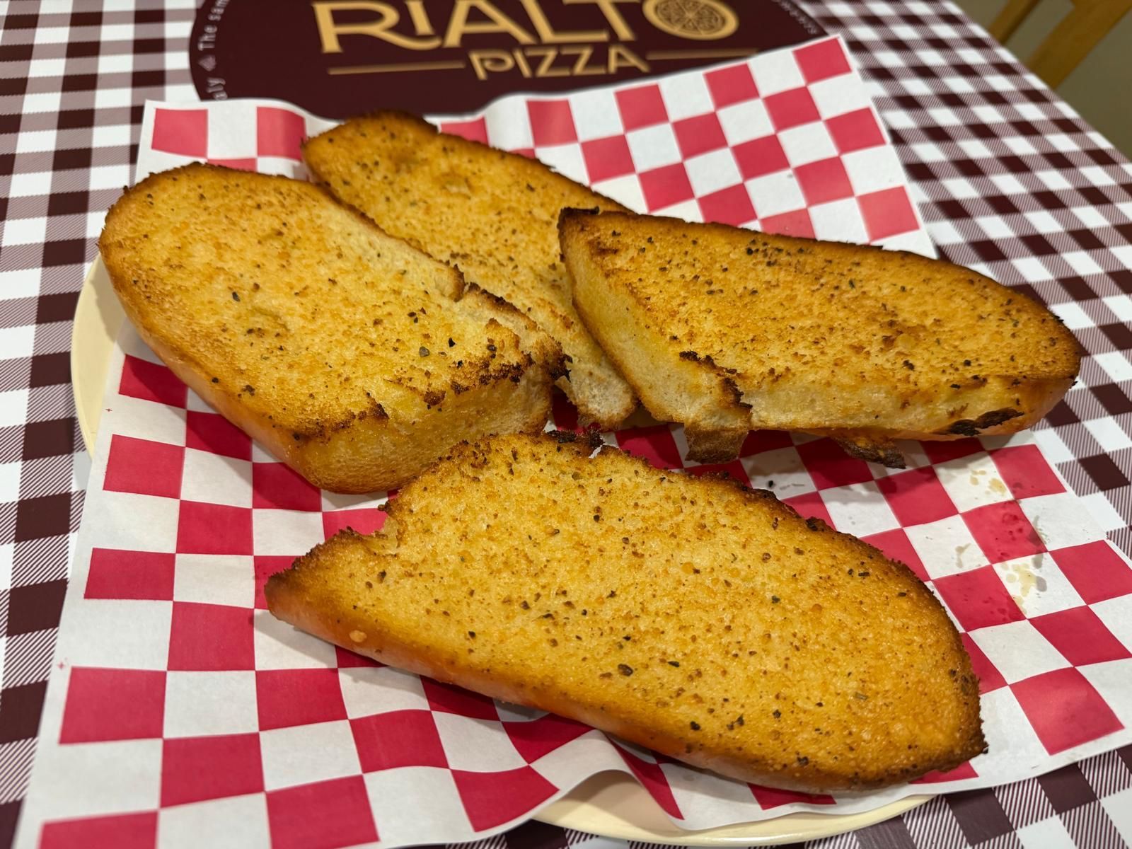 Rialto Pizza lunch special: Chicken wings, fries, and soda for $13.99, Monday 11 AM-3 PM.