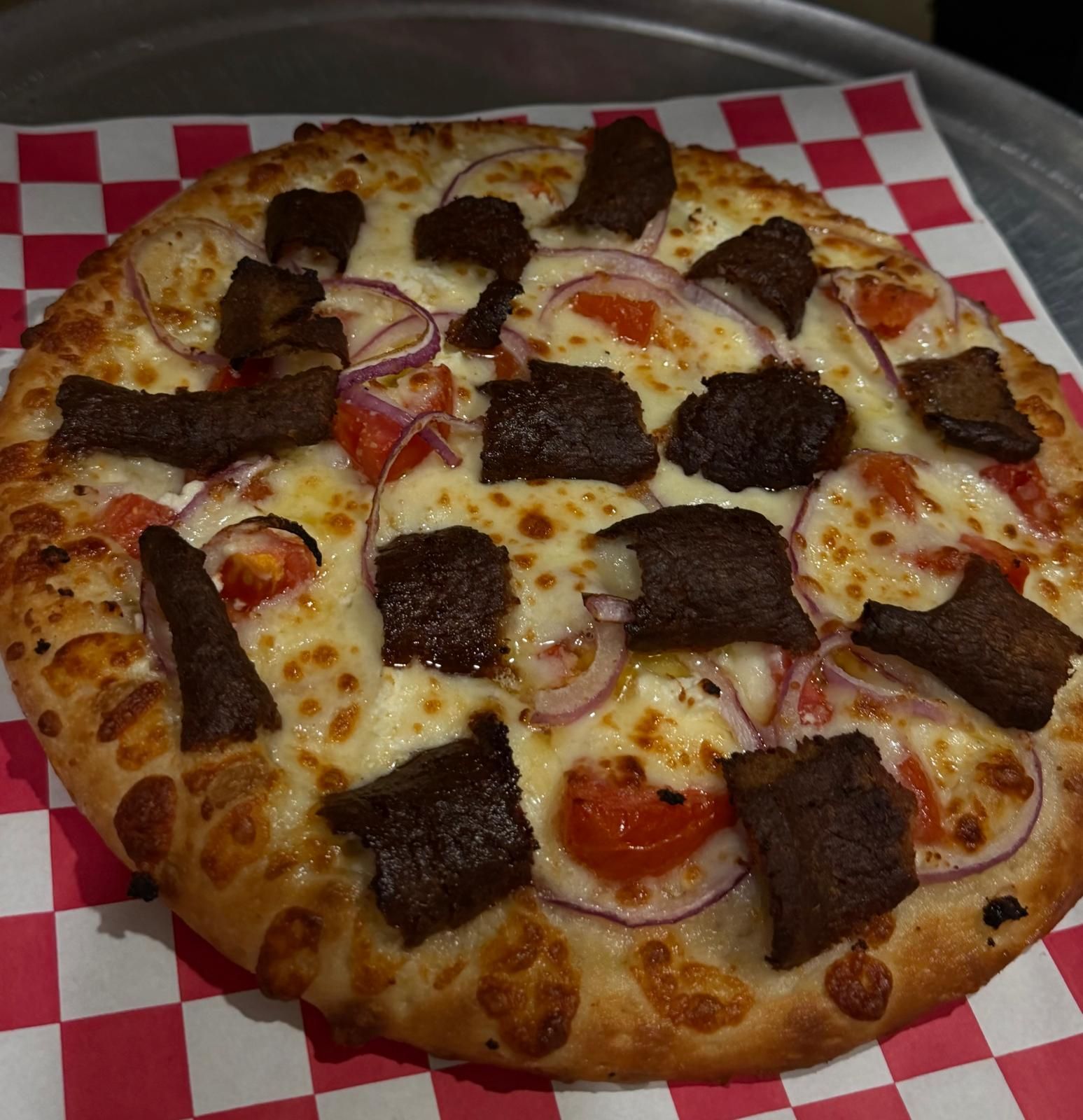 Rialto Pizza lunch special: Chicken wings, fries, and soda for $13.99, Monday 11 AM-3 PM.