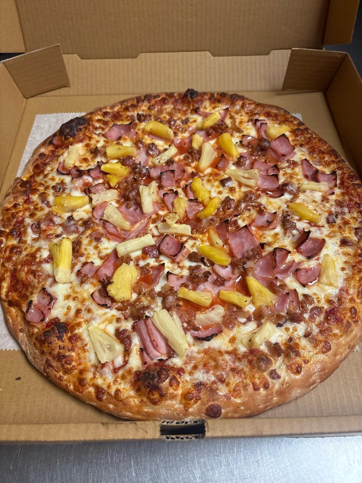 Rialto Pizza lunch special: Chicken wings, fries, and soda for $13.99, Monday 11 AM-3 PM.