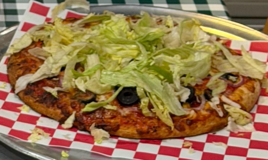 Rialto Pizza lunch special: Chicken wings, fries, and soda for $13.99, Monday 11 AM-3 PM.