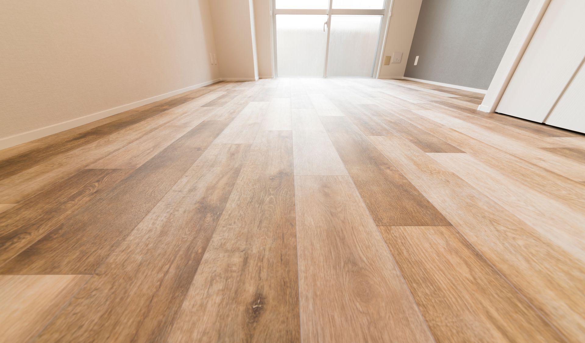 Closeup of light wood flooring with natural grain patterns