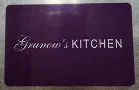 Grunow's Kitchen logo: Black and white circular design. Text: "Dedicated Gluten & Nut Free." 