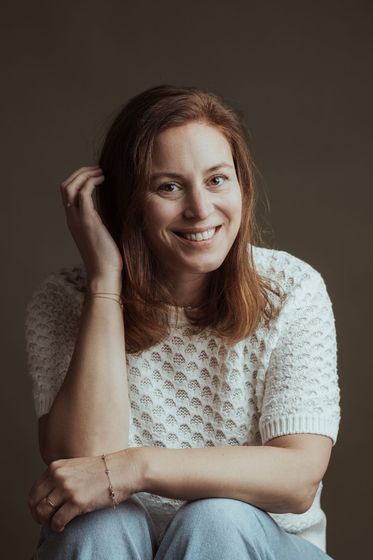 Portret van lachende fotograaf