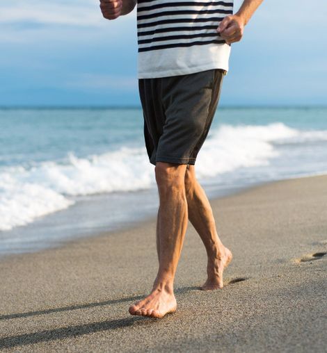 Senior Running on Beach — Longmeadow, MA — Dr. Christopher H. Peteros, DPM, LLC