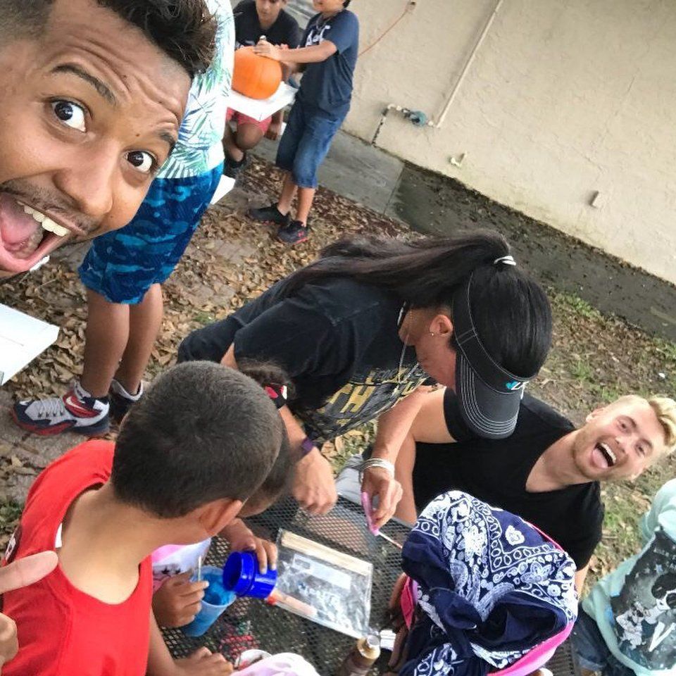 Desmond Garcia with Xander Clemens at a orphanage in Orlando, Florida