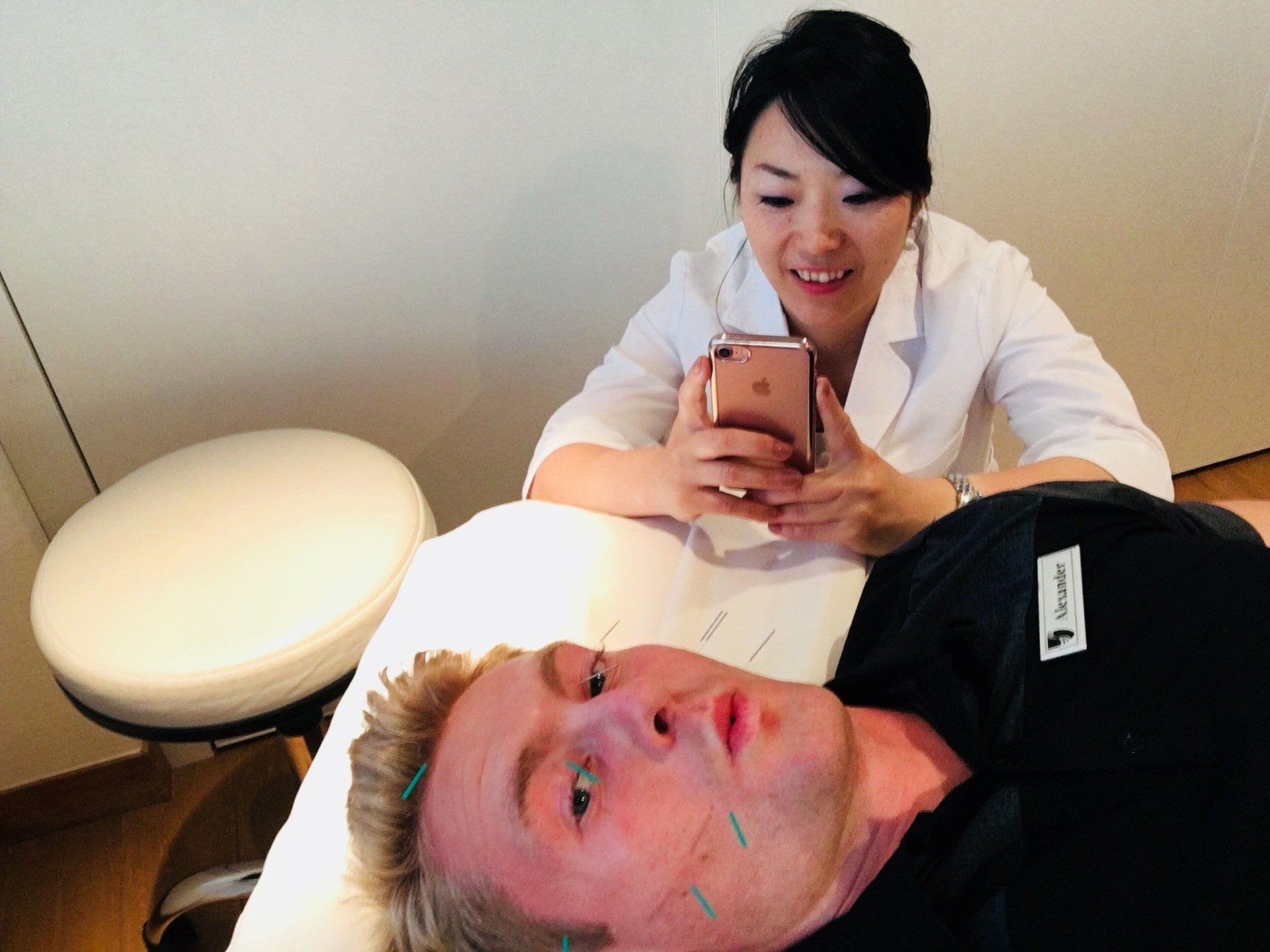 Acupuncture performed on Xander Clemens by Reiko Mitani on the Seabourn Quest  Re