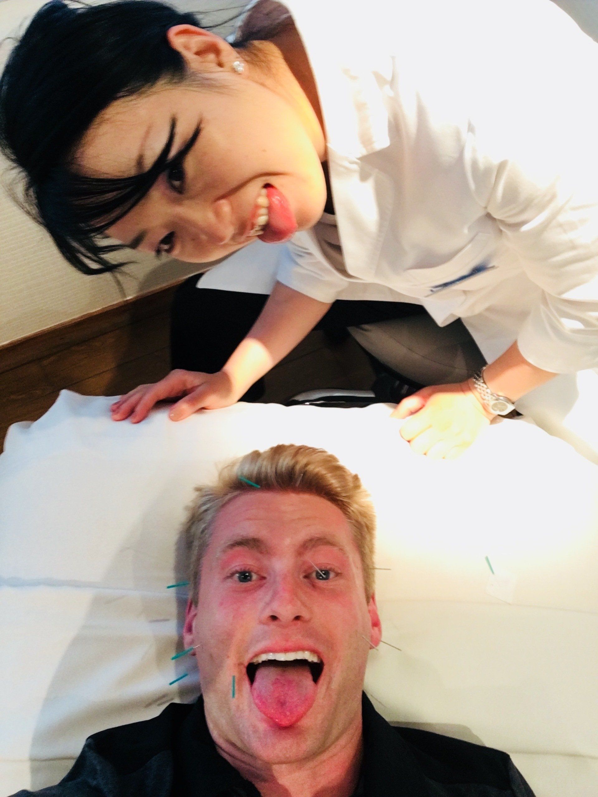 Facial acupuncture performed on Xander Clemens by Reiko Mitani on the Seabourn Quest  Re