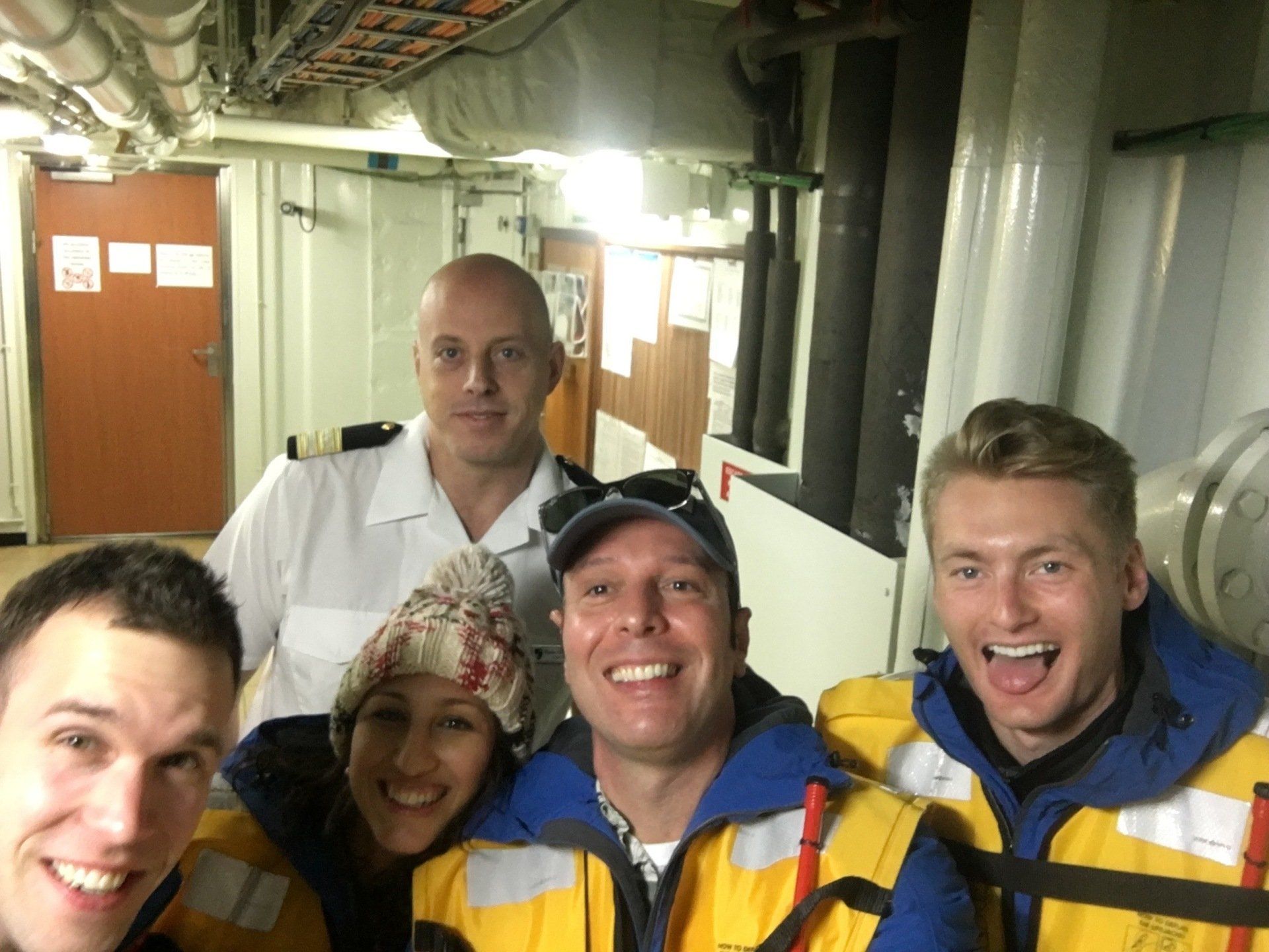 Alex Clemens with crew members from the Seabourn Quest