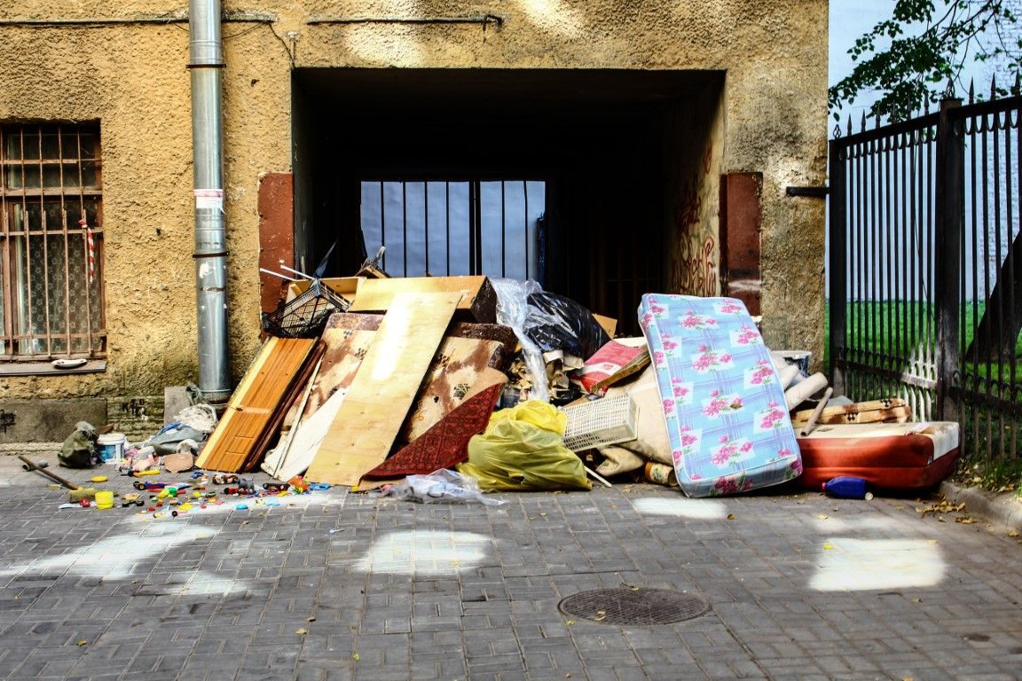 Mattresses and trash left out on street