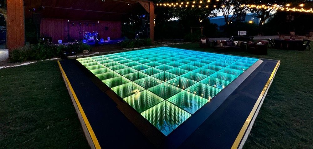 LED Infinity Dance Floor setup inside a party marquee in Manchester
