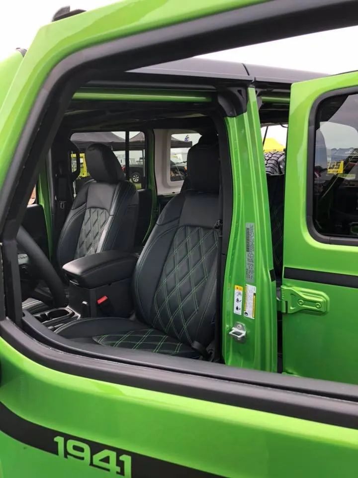 A green truck with the year 1941 on the side