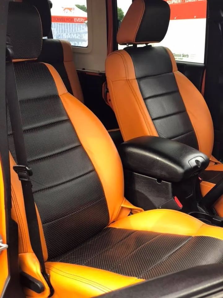 Black and orange leather seats in a car
