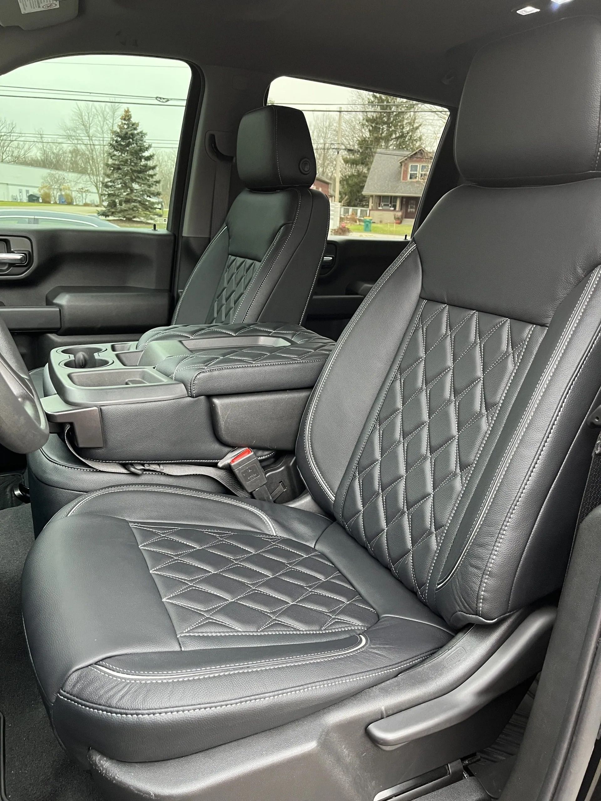 A close up of the front seats of a truck