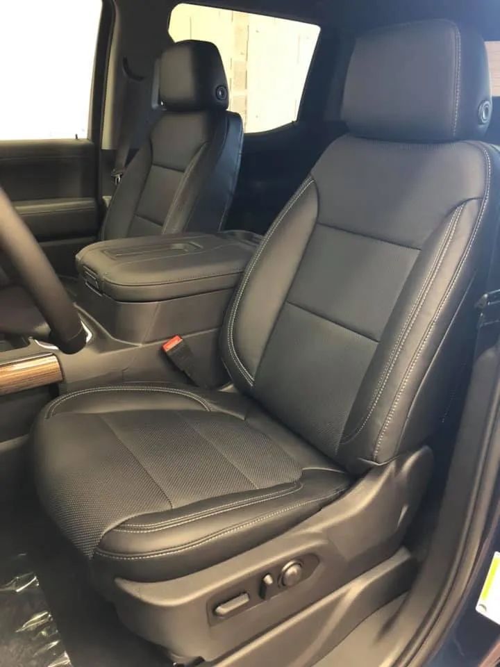 A close up of the front seats of a truck