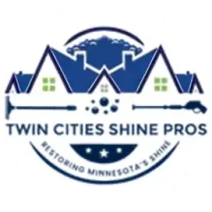 Logo for Twin Cities Shine Pros: blue houses with a pressure washer and cleaning droplets.
