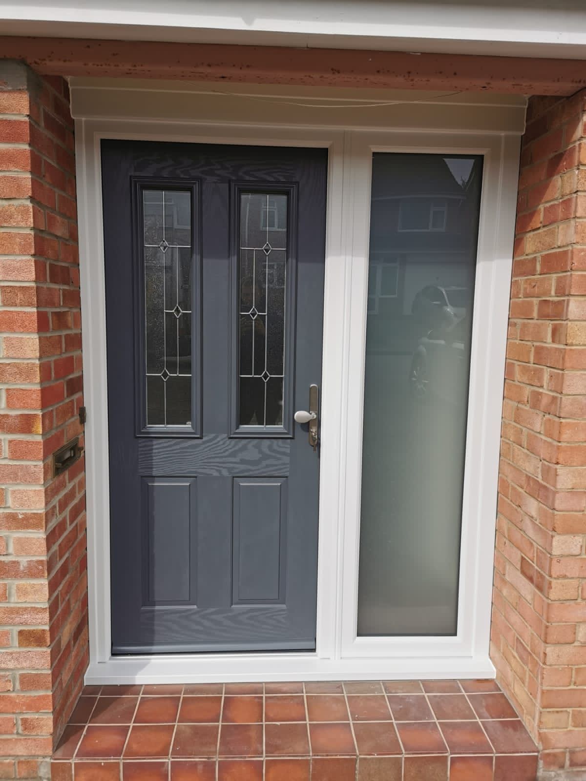 Black Composite Door with White Door Frame
